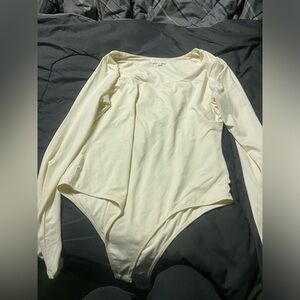 X-Large cream bodysuit from dillards.
only worn once for senior photos